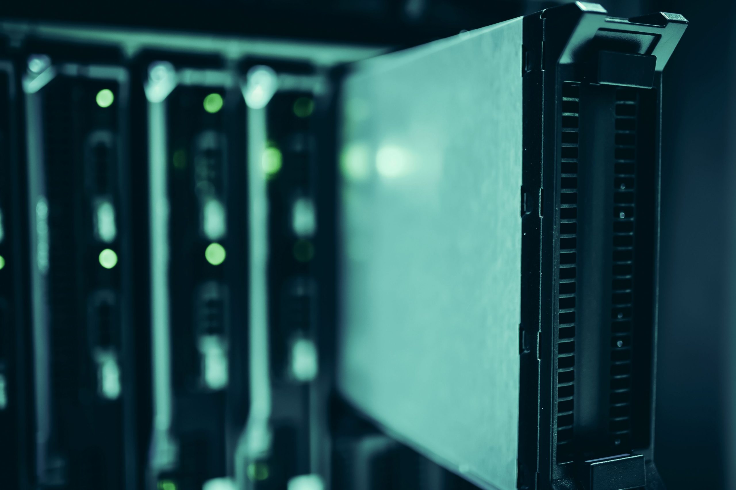 Server racks in a data center housing the supercomputer infrastructure